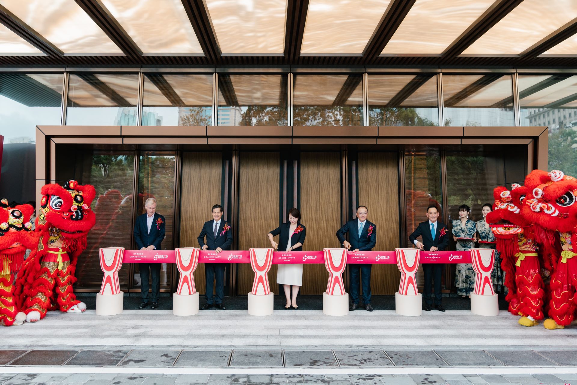 Grand opening ceremony for Grand Hyatt Kunming attended by Hang Lung and Hyatt executives along with Kunming municipal officials